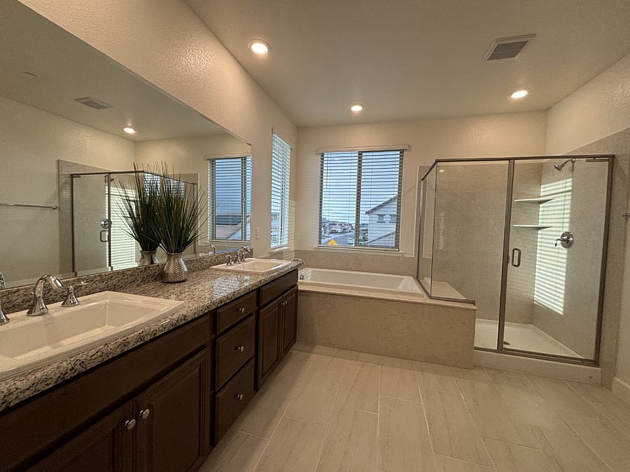 Huge master bathroom with separated bathtub and shower. Double sinks. Makeup desk, Granite countertop.