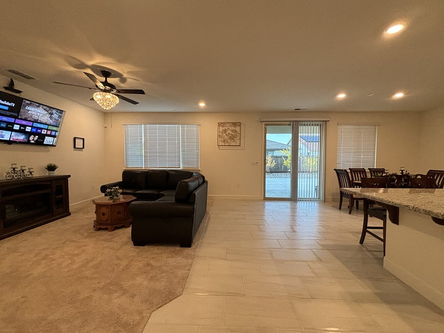 Living family combo next to the kitchen. Brand-new smart TV. Sliding door access to the backyard.