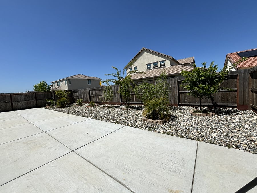 Fully landscaped backyard with many fruit trees ready for this Summer for both the main house and the in-law 1-bedroom suite.