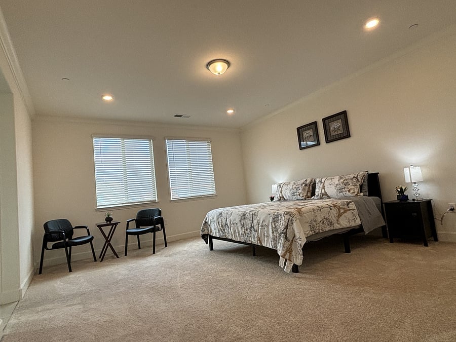 Huge master bedroom with sitting area. Brand-new King bed and mattress with mattress topper.
