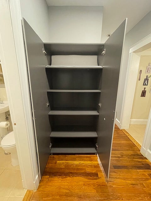 Hallway - Linen/Storage Cabinet outside of Bathroom with ample storage space.