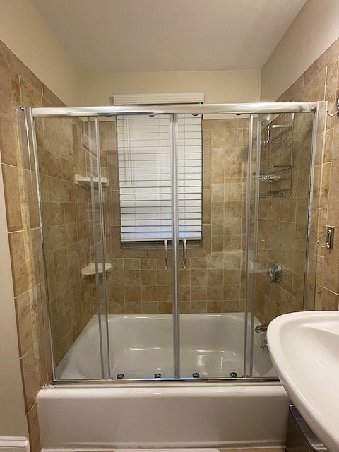 Semi-frameless glass shower door