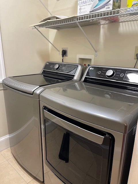 Laundry Rm (adjacent to Kitchen) with LG Washer & Dryer