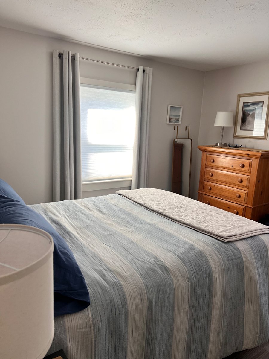 Queen bed, new mattress. Light filtering cellular shades and blackout curtains.
