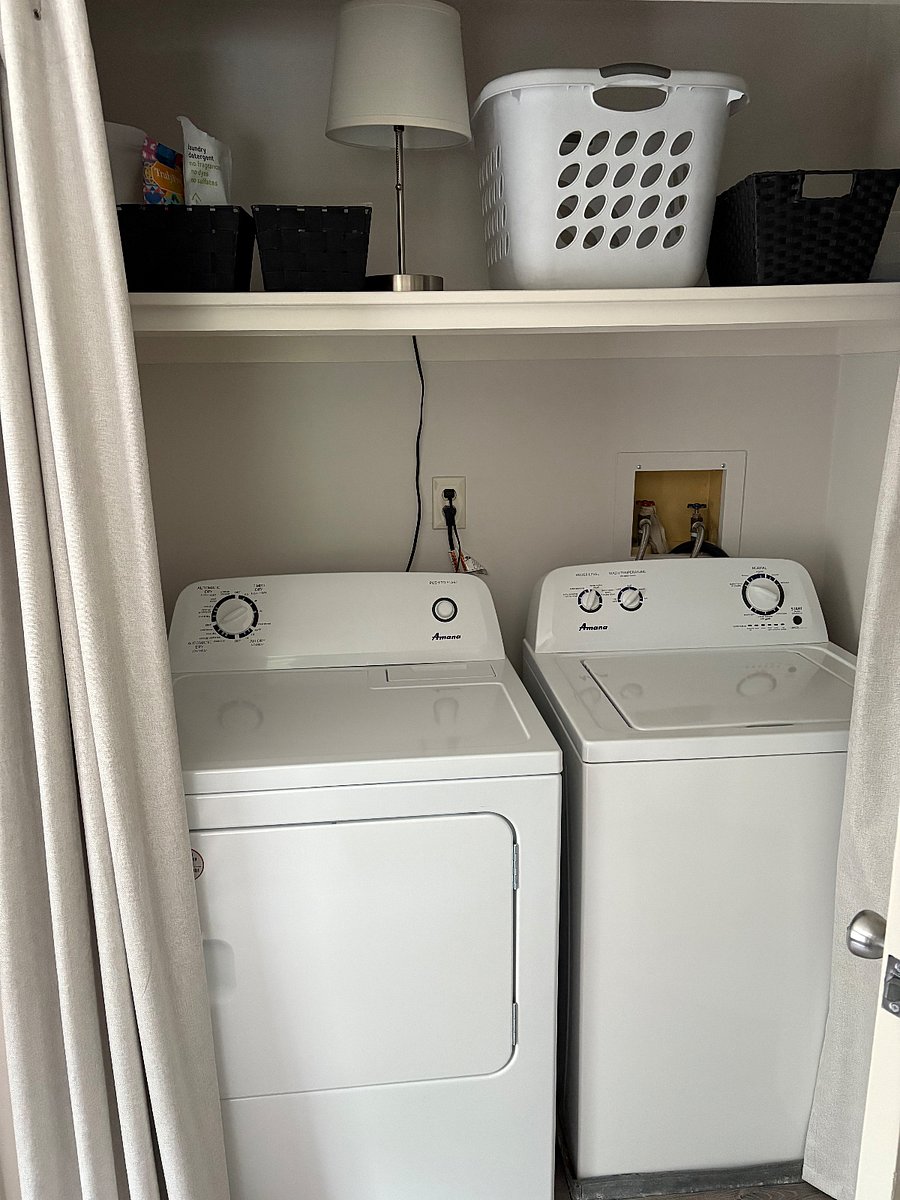New full-size washer and dryer in bedroom