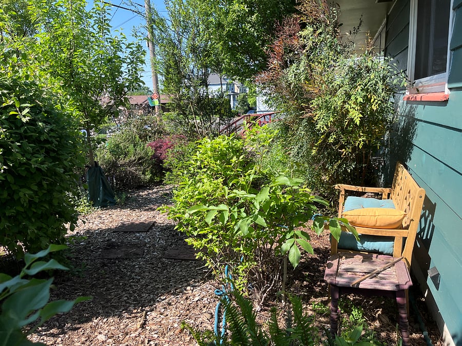 front bench / side of house has shortcut and gate that goes directly to rear patio/yard 