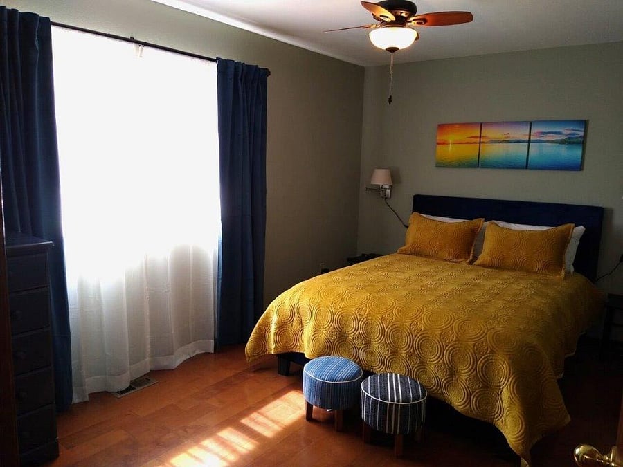 2nd bedroom with Queen bed and sunblock curtains.