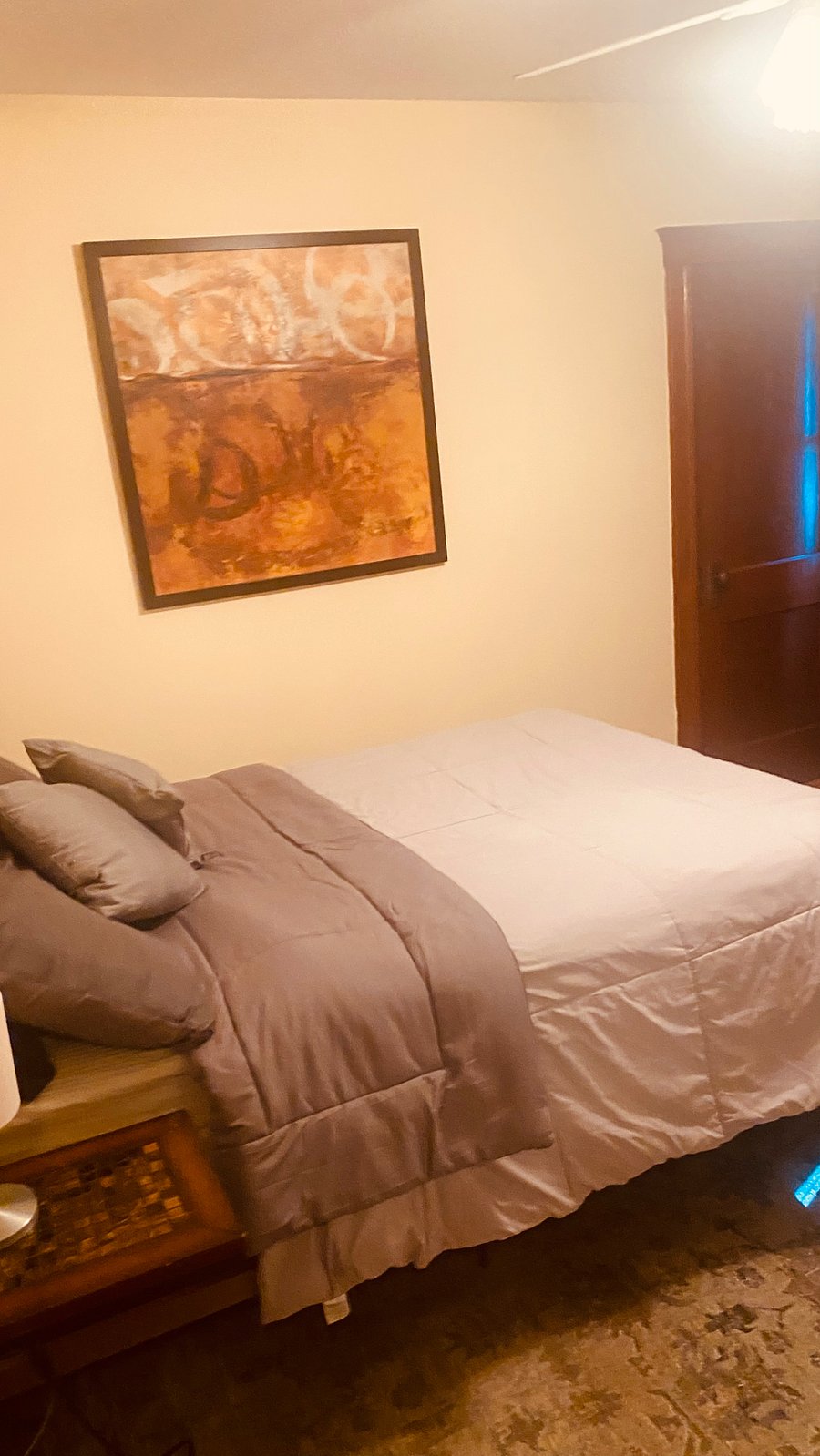 Freshly painted back bedroom featuring brand new full sized bed. 