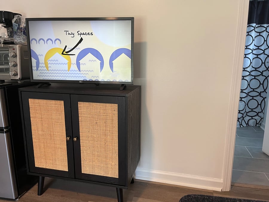 Smart TV on tv stand with storage