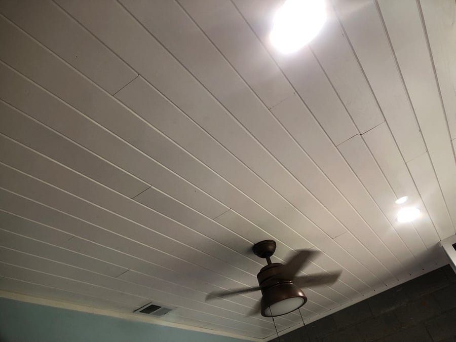 High real wood tongue and groove ceilings. Ceiling fan