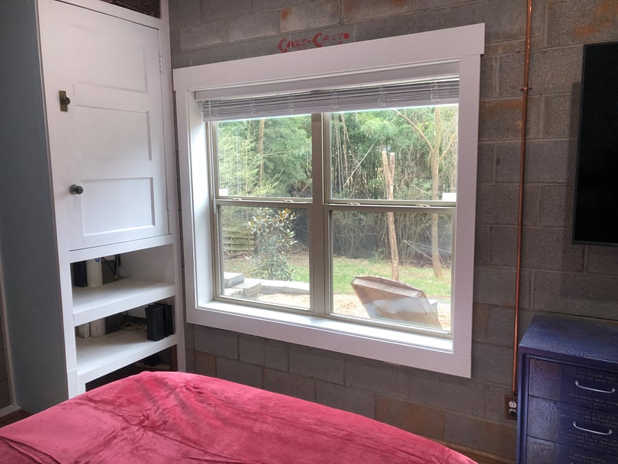 Nice windows let in light and overlook back yard. High quality shades to block the light when needed.