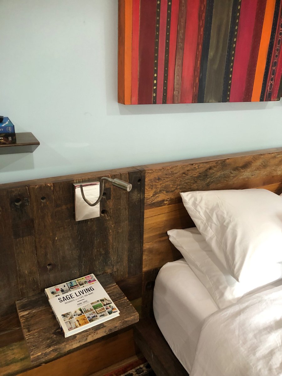 Lights in the headboard for reading. Great memory foam and feather pillows. Quality bedding.