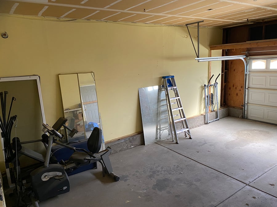 Two-car garage with exercise equipment