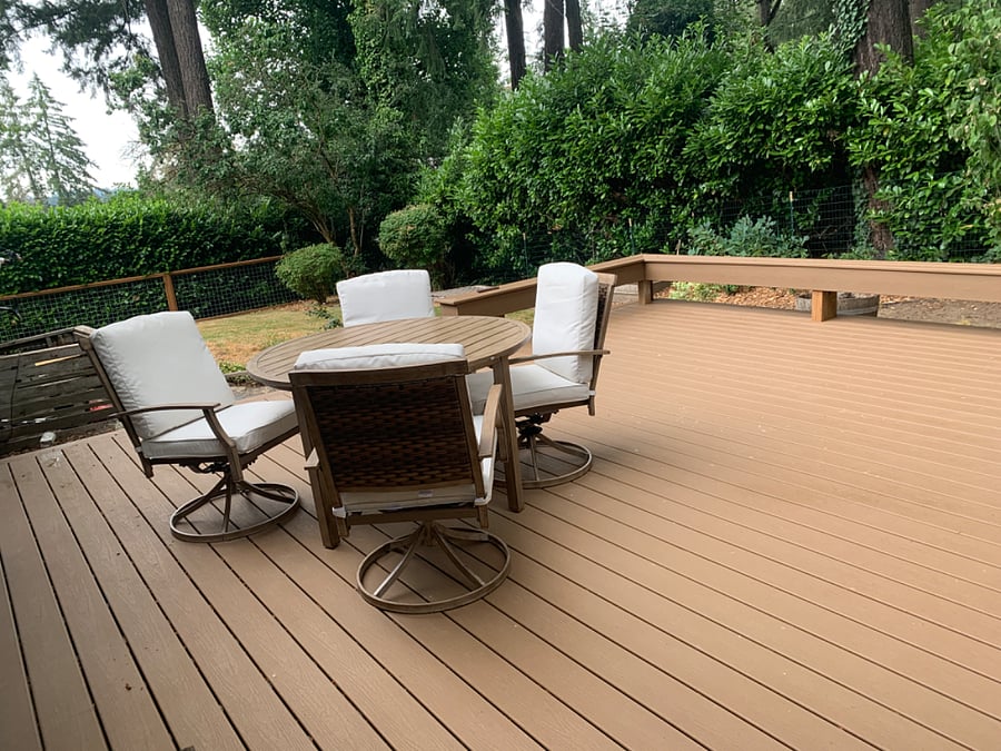 Backyard deck 20x20. There is a 12x16 sports equipment shed on the right side of the deck now that is accessible on the deck. Has been used for skis, bikes, gear. Provided empty for guest use.