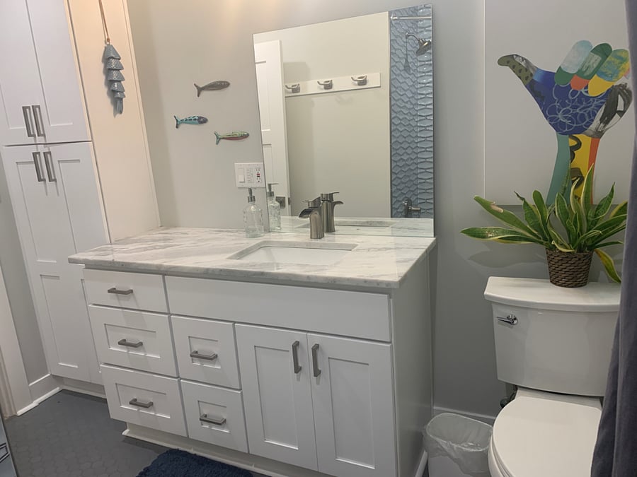 Lots of bathroom storage in drawers for 3 people.