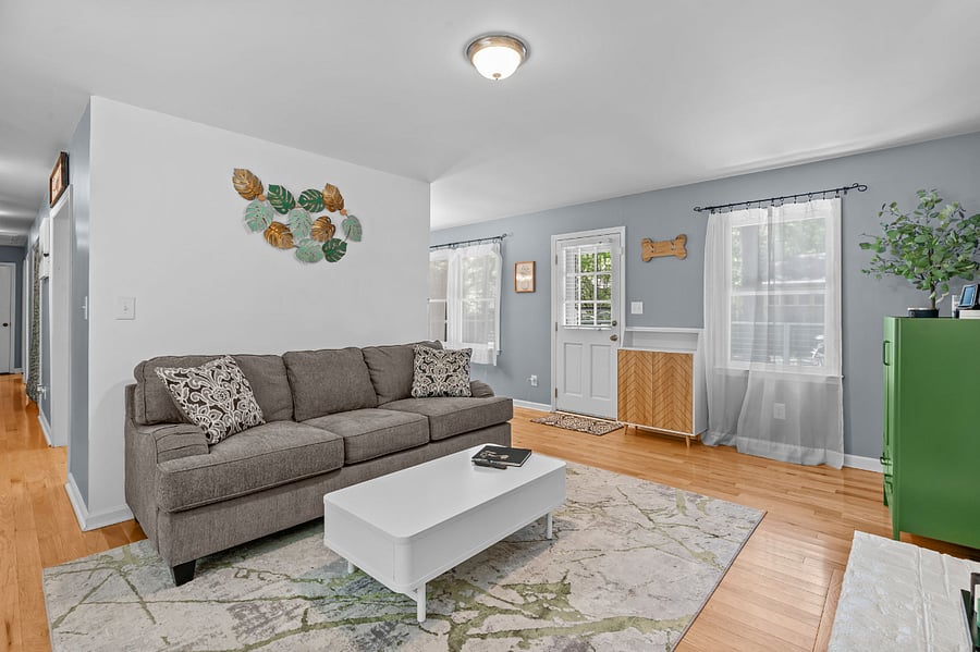 Comfortable living space with a smart TV and storage.