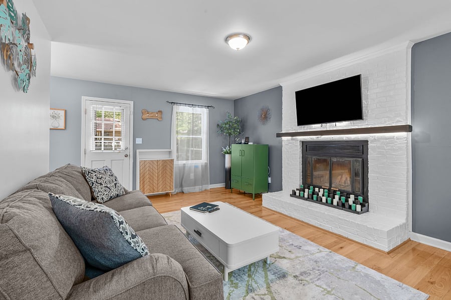 Comfortable living space with a smart TV and storage.