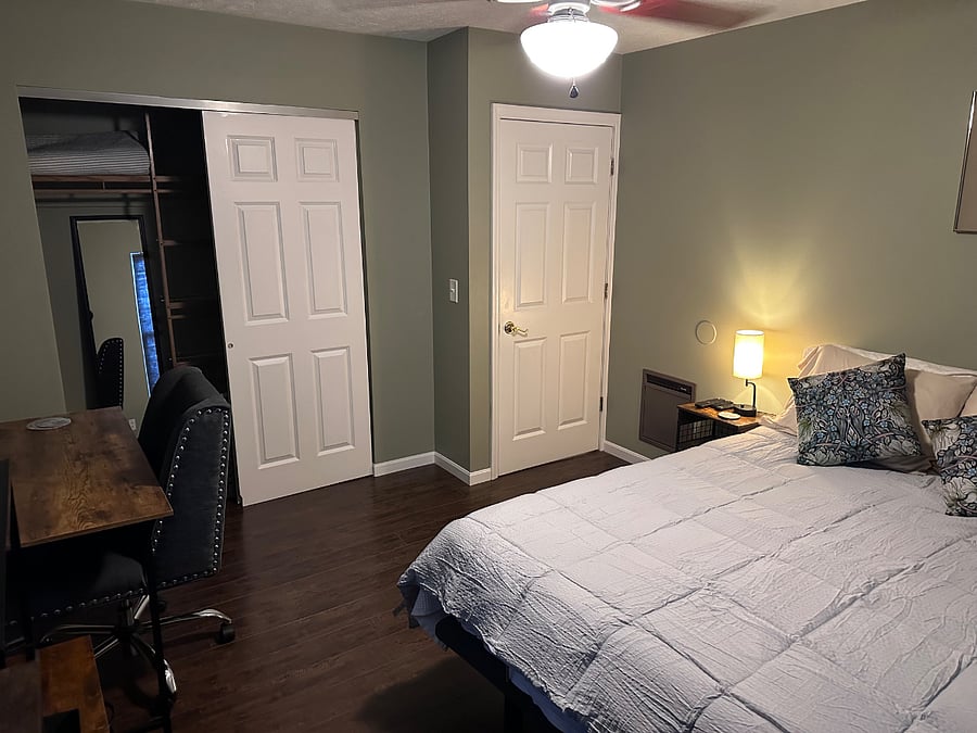 Bedroom 1 w/ built in Safe and built in Closet Shelving Unit