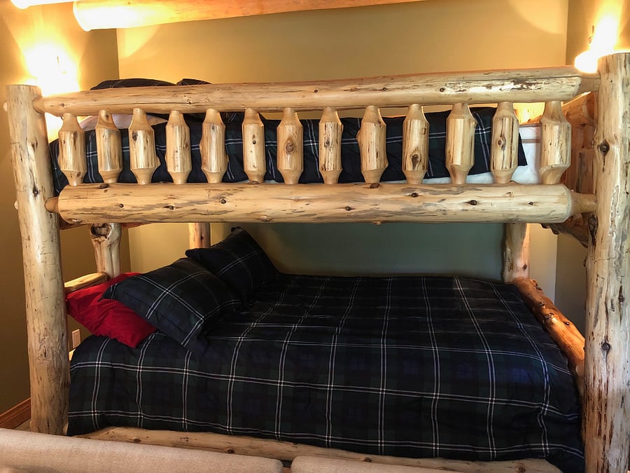 LIVING RM DOWNSTAIRS HAS 2 QUEENSIZE ASPEN BUNK BEDS- RARE TO BE THAT LARGE
