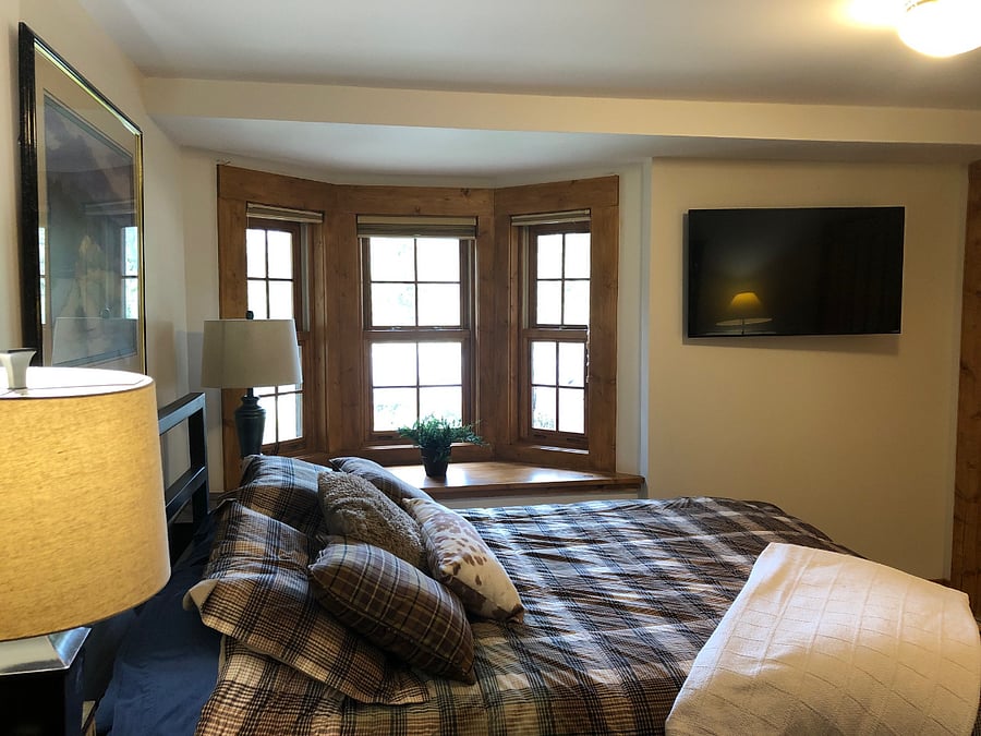 3RD BEDROOM HAS A QUEEN BED, TV, DRESSER AND CLOSET