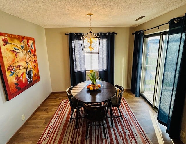 Eat-in kitchen with gorgeous natural light and access to the patio