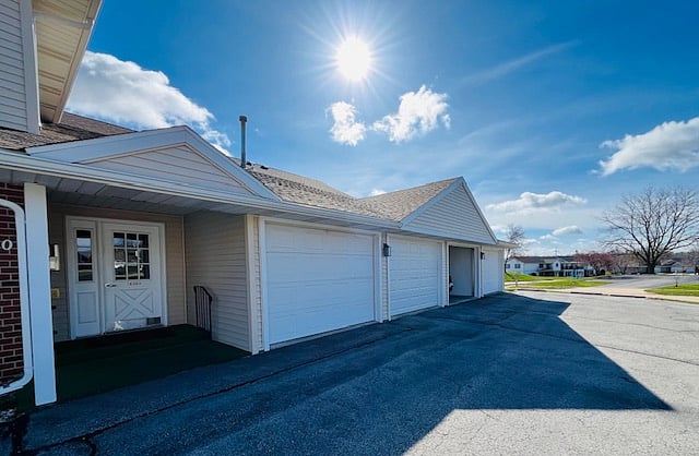 This is the exterior front door. Each unit has a garage stall ATTACHED to the condo so that you can drive in, close the garage door and not have to walk outside to enter the building. 