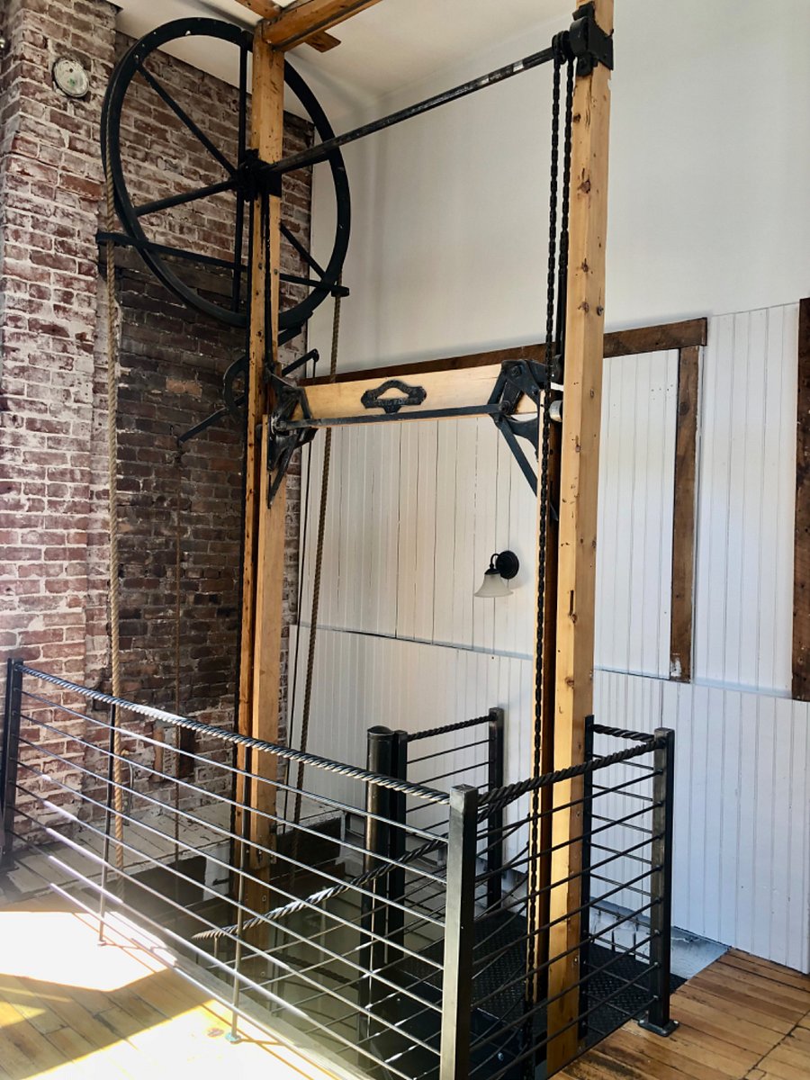 REMNANTS OF AN OLD ELEVATOR- NOW WE HAVE A STEEL SPIRAL STAIR