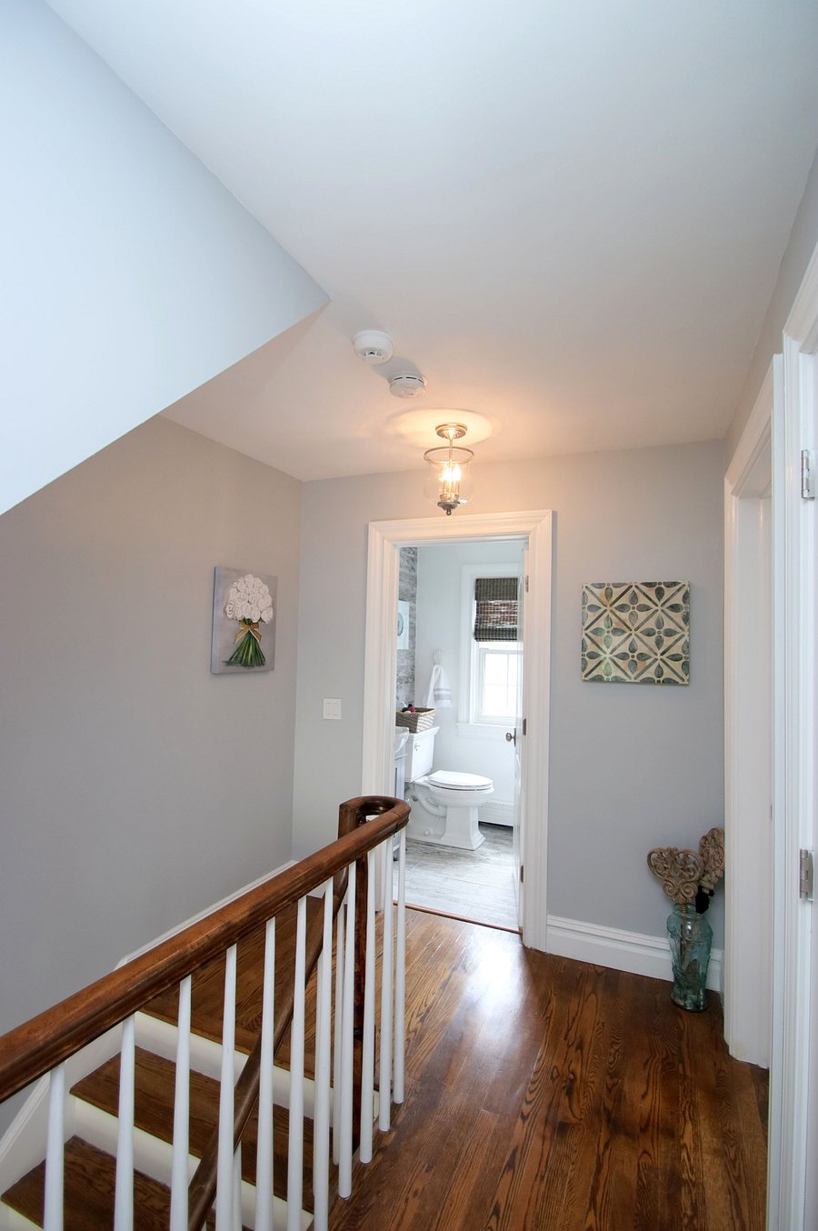 Upstairs landing showing the full bathroom.