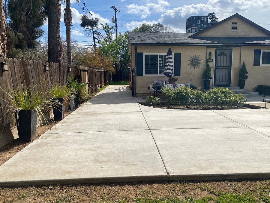 Side access to apt with parking spot in front