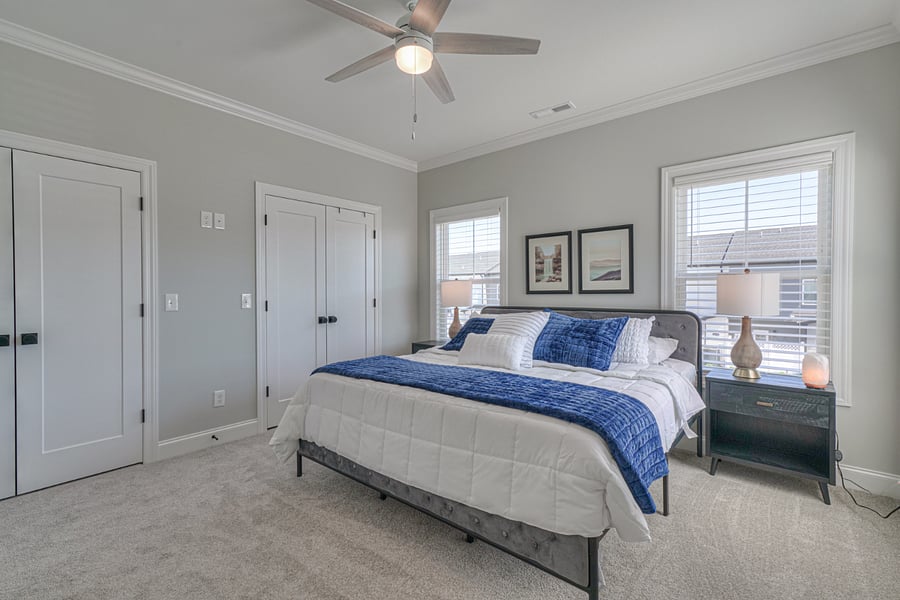 Bedroom 1 features a king sized bed and 2 closets, private bath with walk in shower and linen closet.