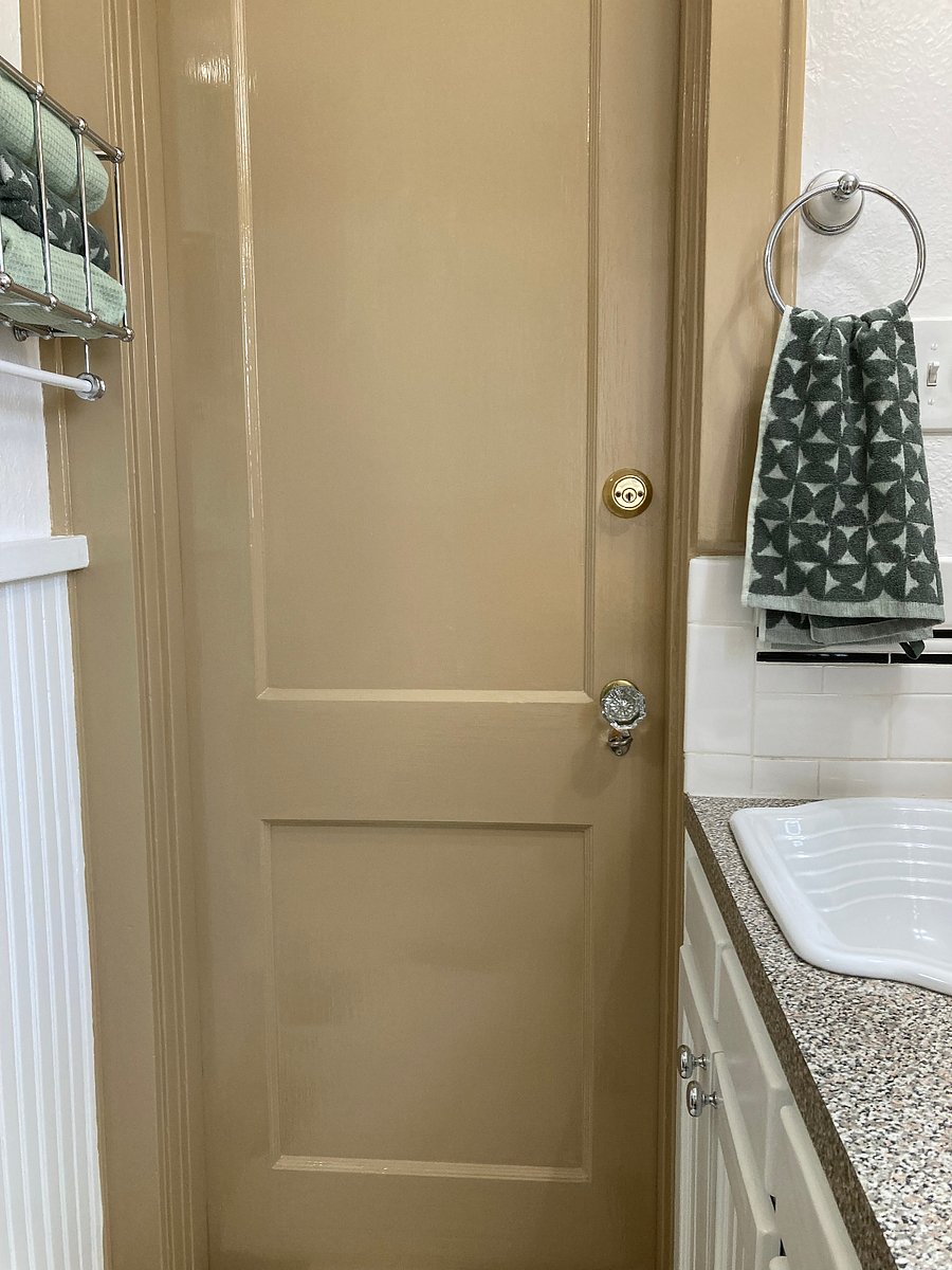 Connecting door to the house. Note lock