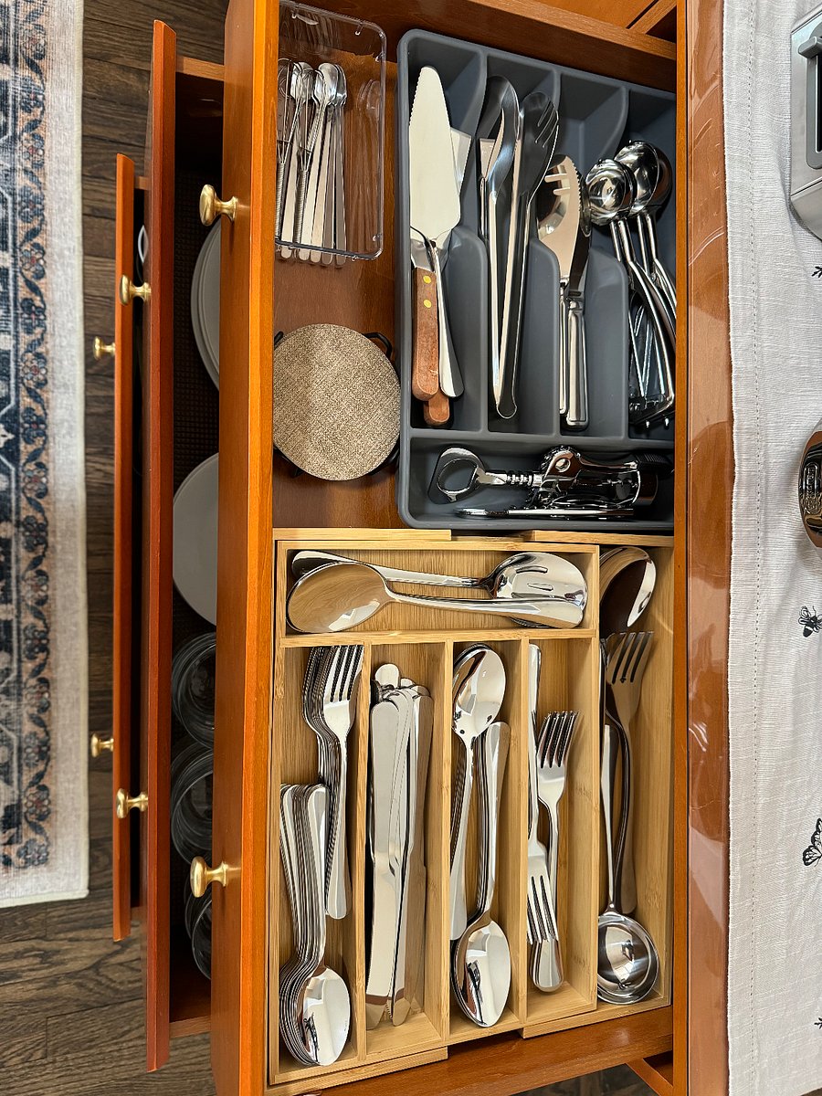 Utensils inside side table in the dining room