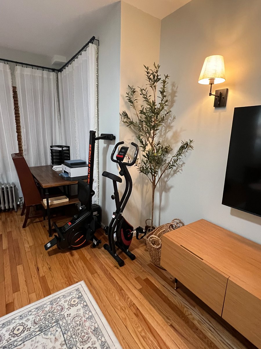 Upright, easy-store & move exercise bike and rower (both with 2 wheels on one end to move)