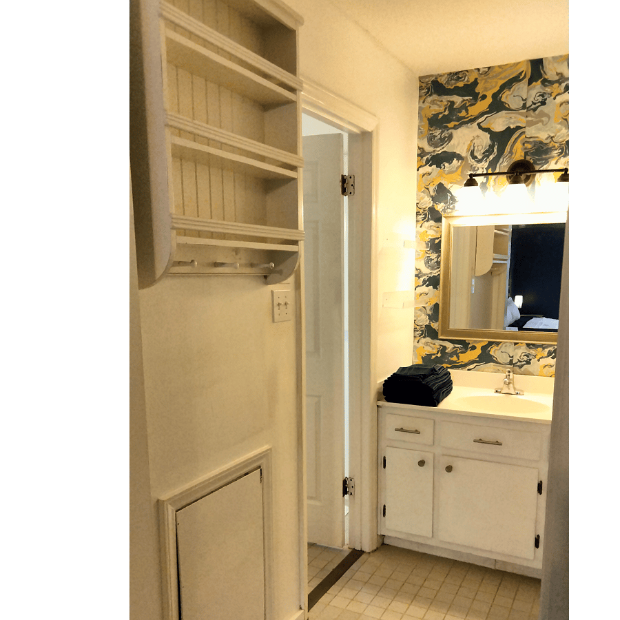 Vanity between closet and bathroom