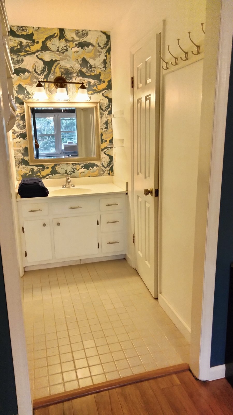 Vanity between closet and bathroom