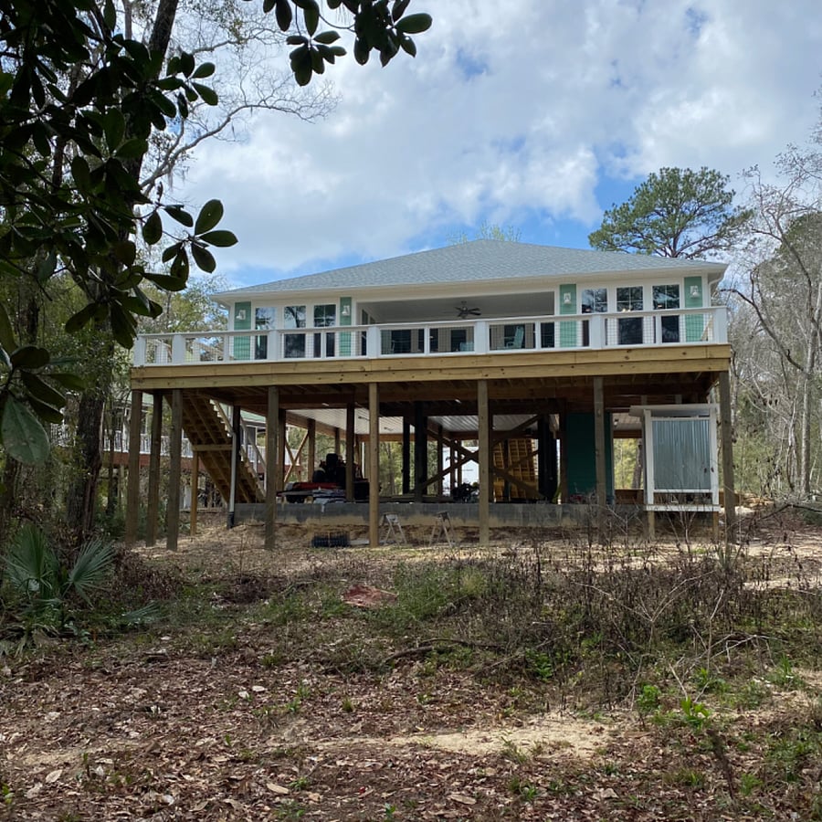 Back of house facing Alaqua Creek
