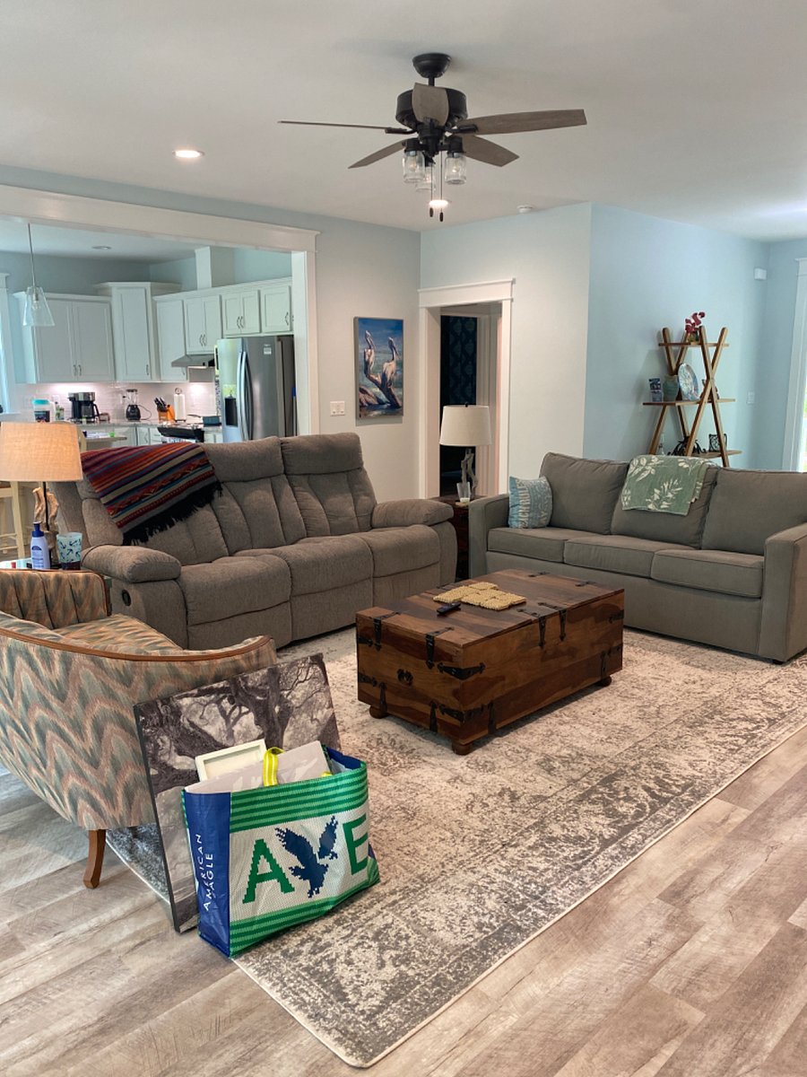 One reclining sofa and one hide-a-bed sofa