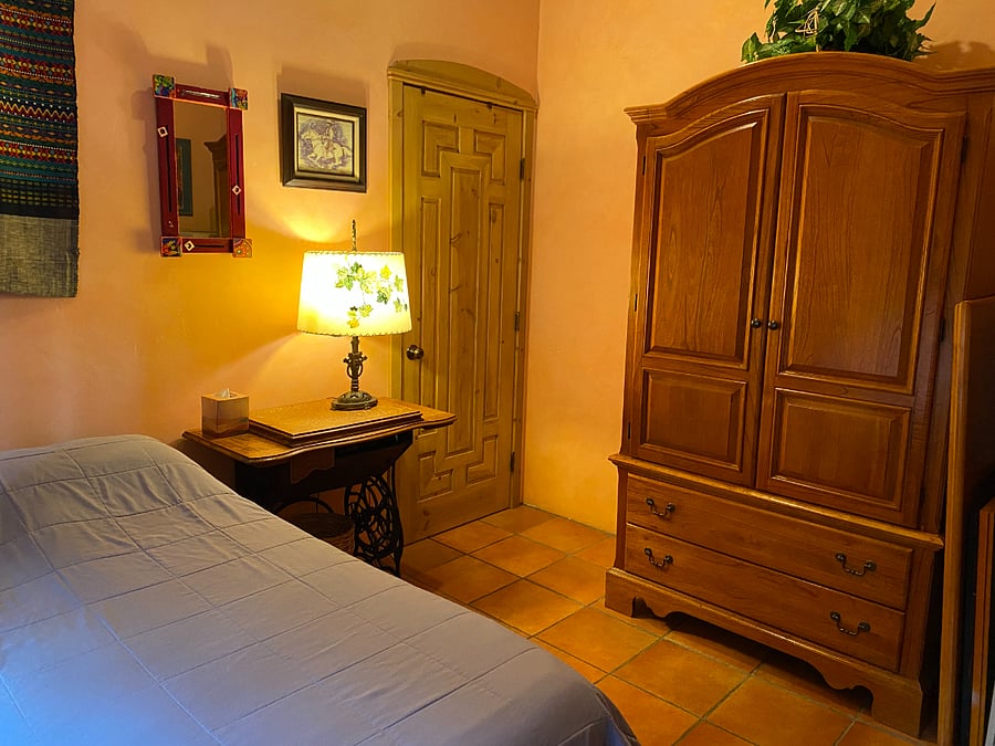 Guest bedroom with armoire for clothes