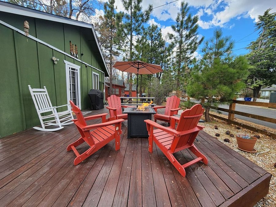 Picture yourself relaxing on this beautiful, spacious deck! Perfect for lounging, BBQs, dining, and socializing, it offers peaceful quiet, the gentle sound of birds, and the fresh scent of pine in the air. 