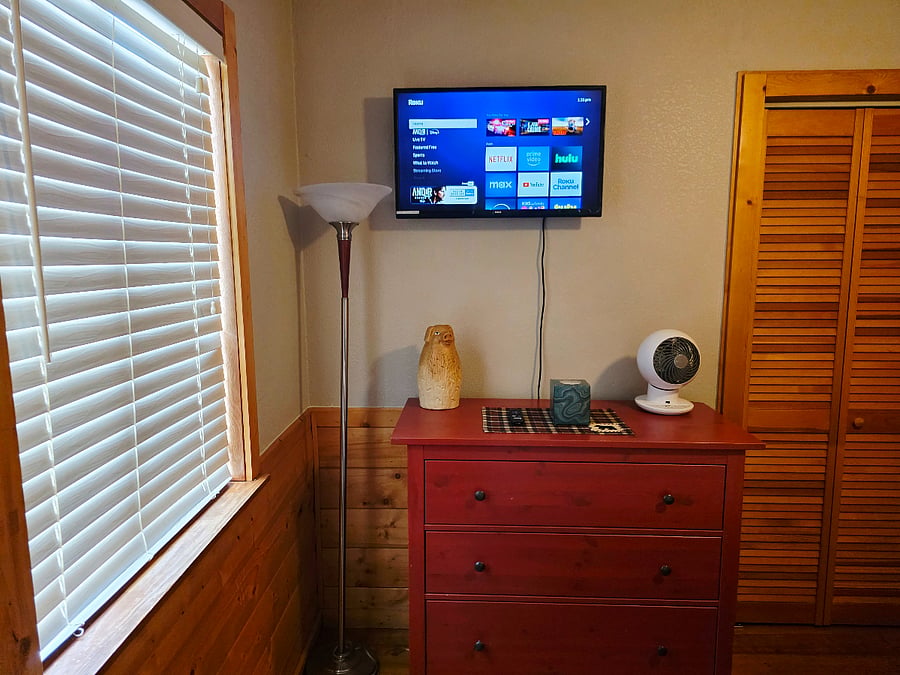 Our spare bedroom is fully equipped with a TV, dresser, fan, space heater, extra blankets, and all the comforts of homeoffering the same cozy convenience as the main bedroom. 