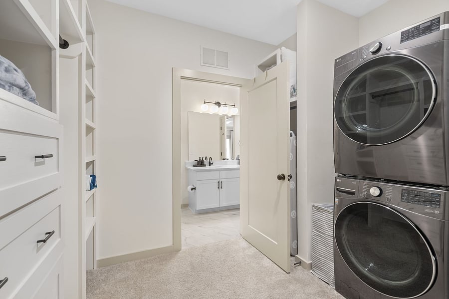 In unit washer and dryer is conveniently located in the walk in closet