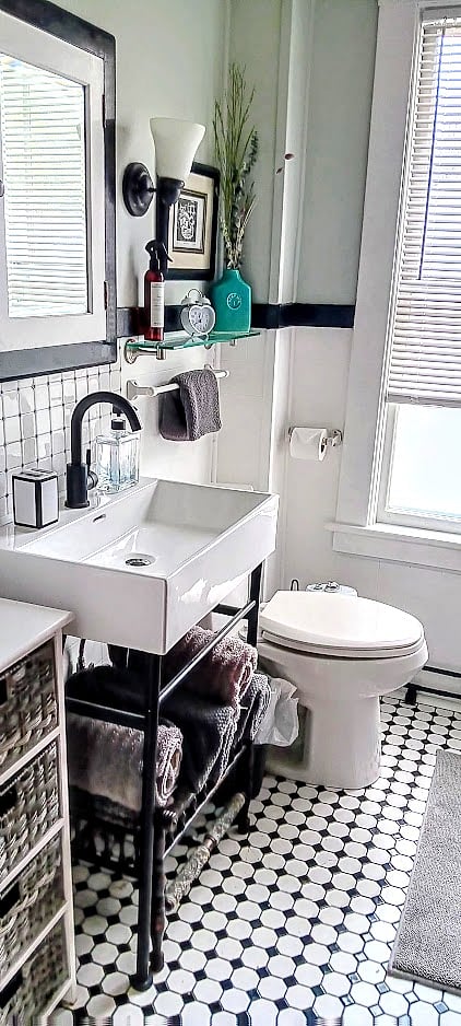 Updated bathroom with clawfoot tub and shower.