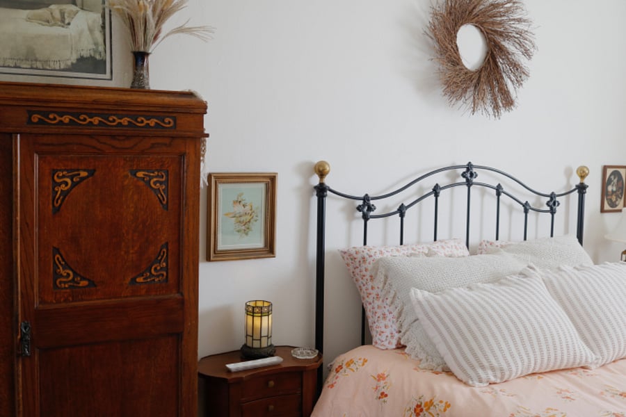 Master Bedroom with Queen Sized Bed, a Wardrobe and a large dresser.