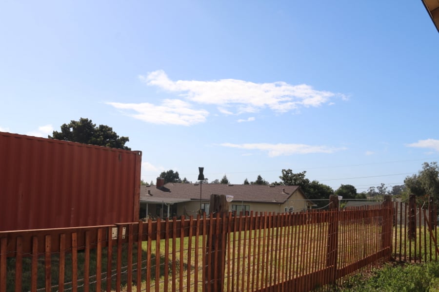 Views from the dog run. This area is large enough for a chair if you desire to soak up the sun.