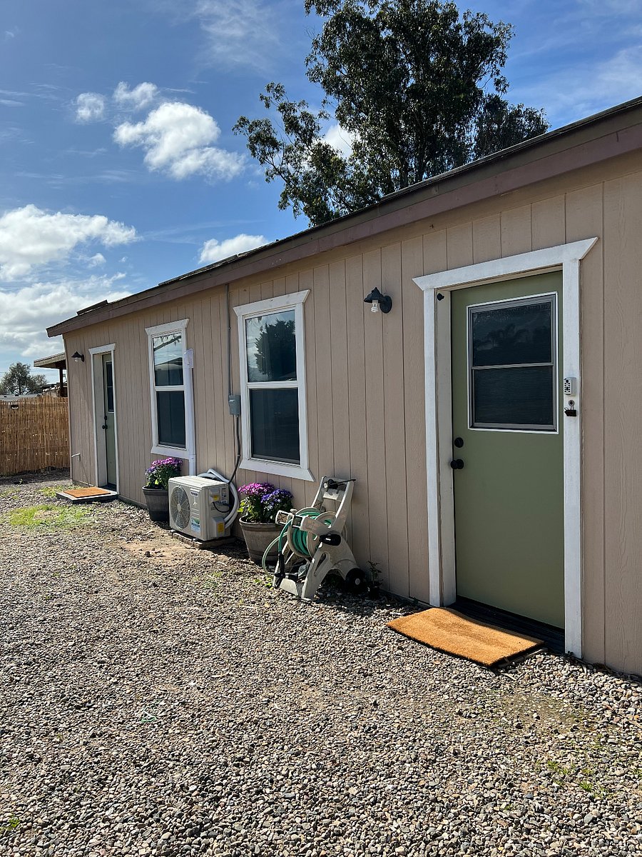 Exterior has two entrances. This structure sits at the rear of our property.