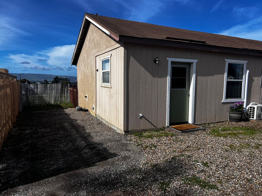 Your own parking pad, close to the second door and utility room entrance.