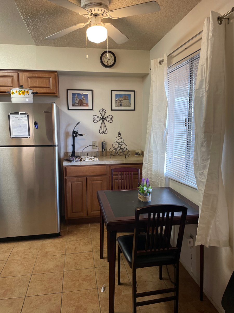 Kitchen eating space and bar area.