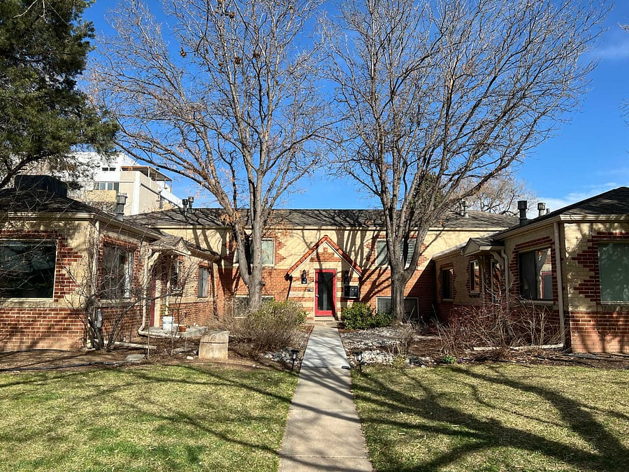 The property has a lot of fully mature trees in the front.