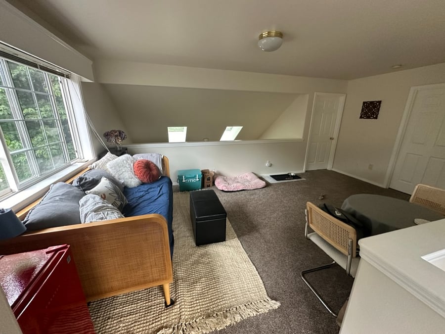 upstairs bedroom and bathroom door are off of the loft space