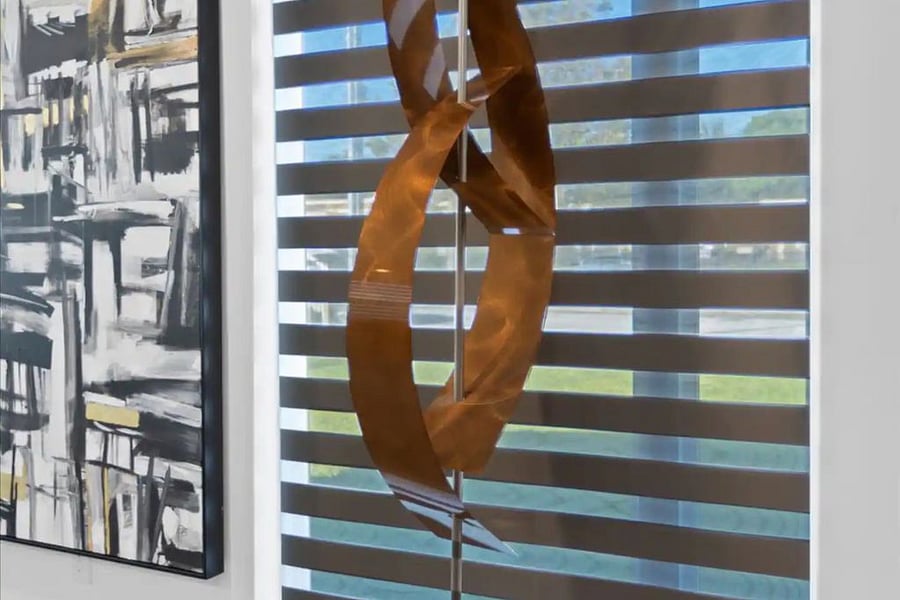This Beautiful Custom Scultpture is install outside in front of the home!